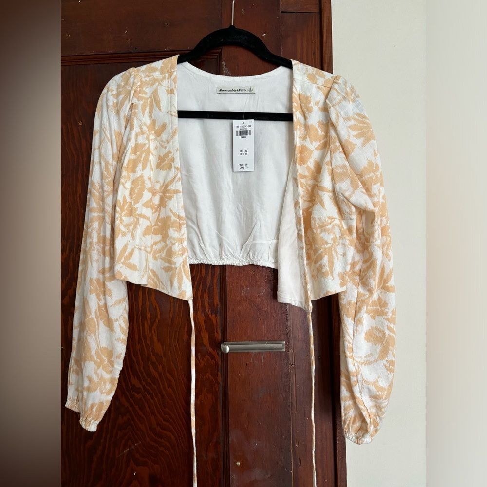 Two piece set. Sold together. Long sleeve shirt and shorts. Palm tree pattern.